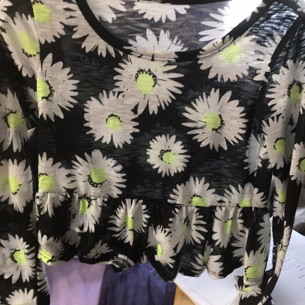 A long sleeved shirt with flowers